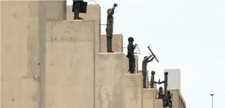  ?? PICTURE: DUMISANI SIBEKO ?? CLIMB TO FREEDOM CONTINUES: Statues commemorat­ing the Freedom Charter have been created at Walter Sisulu Square in Kliptown.