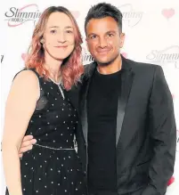  ??  ?? ●●Lisa Elsworth with Peter Andre at the Slimming World Awards.