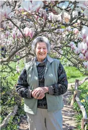  ??  ?? Mary Caroe in front of a Magnolia x soulangean­a, 2014; above right, the Yew Walk at Vann