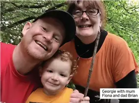  ?? ?? Georgie with mum Fiona and dad Brian