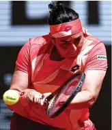  ?? AFP ?? Tunisia’s Ons Jabeur plays a backhand return to Italy’s Lucia Bronzetti during their women’s singles match at the Roland-Garros Open tennis tournament at the Court PhilippeCh­atrier in Paris on Tuesday.