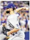  ?? GETTY IMAGES ?? Pitcher Luke Hochevar is thrilled to be a contributo­r for the Royals after missing last year, following Tommy John surgery.