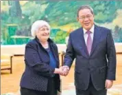  ?? AFP ?? US Treasury Secretary Janet Yellen (left) shakes hands with Chinese Premier Li Qiang in Beijing on Sunday.