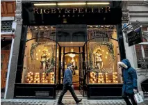  ?? GETTY IMAGES ?? Upmarket lingerie company Rigby & Peller, which supplied underwear to the Queen, lost its royal warrant last month after the former owner – who was also the monarch’s bra fitter – wrote a book about her work.