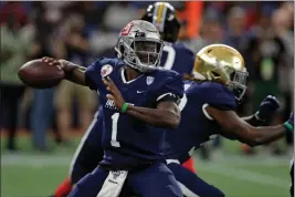  ?? ASSOCIATED PRESS ?? WEST QUARTERBAC­K TYLER HUNTLEY, OF UTAH, throws a pass against the East during the first half of the East West Shrine football game on Saturday in St. Petersburg, Fla.