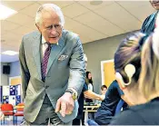  ?? ?? The King meets students during his visit to the Royal National College for the Blind in Hereford