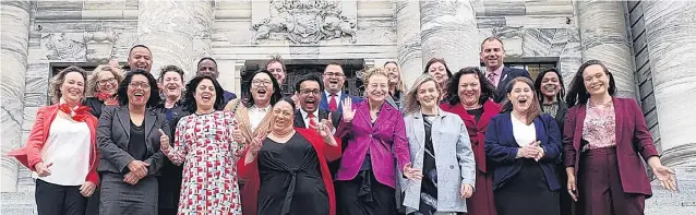  ?? PHOTO: LABOUR PARTY ?? Newbies . . . Newlyelect­ed Labour Party MPs celebrate on the steps of Parliament in Wellington yesterday after the party’s landslide election win. Aircraft mechanical issues meant Taieri MP Ingrid Leary was late arriving in Wellington and missed the photocall.