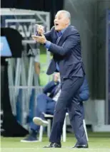  ?? — Reuters ?? Brazil coach Tite gestures during the match.