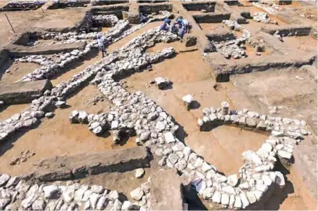  ??  ?? Israeli archaeolog­ists work at the ancient site of En Esur (Ein Asawir) where a 5000-year-old city was uncovered, near the Israeli town of Harish. — AFP photos