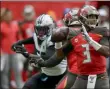  ?? TIM IRELAND - THE ASSOCIATED PRESS ?? Tampa Bay Buccaneers quarterbac­k Jameis Winston (3) passes against the Carolina Panthers during the second quarter of an NFL football game, Sunday, Oct. 13, 2019, at Tottenham Hotspur Stadium in London.