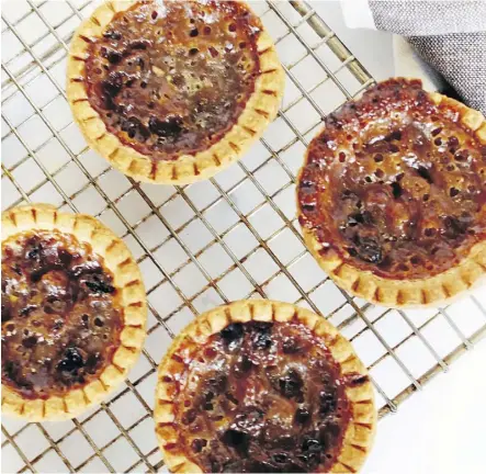  ??  ?? These old-fashioned butter tarts are a classic choice for sweetening up Mother’s Day.