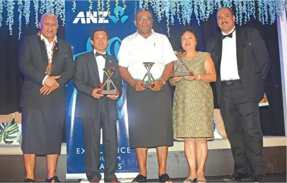  ?? Photo: Waisea Nasokia ?? From left: Prime Minister Voreqe Bainimaram­a, with the 2017 lifetime award winners Patrick Wong, former Air Pacific (now Fiji Airways) chief pilot Captain Matereti Tuisue, Jenny Seeto and Trustee Craig Powell during the ANZ Fiji Excellence in Tourism Awards at the Denarau Convention Centre in Denarau, Nadi, on February 17, 2018.