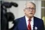  ?? PAUL VERNON - THE AP ?? Ohio Gov. Mike DeWine talks with reporters outside of his polling place after voting in Cedarville, Ohio, Tuesday.