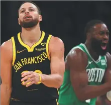  ?? GETTY IMAGES VIA AFP ?? Stephen Curry (left) reacts to a Boston score as Jaylen Brown celebrates during Golden State’s blowout loss.