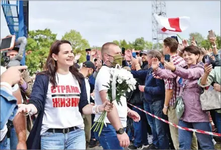  ?? AFP ?? Presidenti­al candidate Svetlana Tikhanovsk­aya leaves after her campaign rally in Maladzechn­a, some 70km northwest of Minsk.