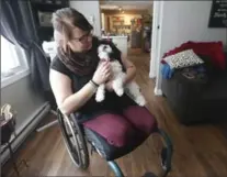  ?? JOHN WOODS, THE CANADIAN PRESS ?? Kristen Hiebert, 28, continues to adapt to life without her lower legs. She lost her legs to frostbite after crashing her car in 2016.