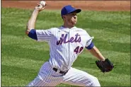  ?? KATHY WILLENS — THE ASSOCIATED PRESS ?? New York Mets starting pitcher Jacob deGrom winds up during the second inning of a baseball game against the Philadelph­ia Phillies, Sunday, Sept. 6, 2020, in New York.