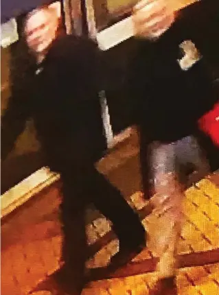  ??  ?? On CCTV: Couple thought to be spy and his daughter leave restaurant