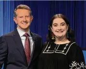  ?? Courtesy of Kate Campolieta ?? Jeopardy! contestant Kate Campolieta from Simsbury, Connecticu­t, pictured with host Ken Jennings during her first appearance in July 2023.