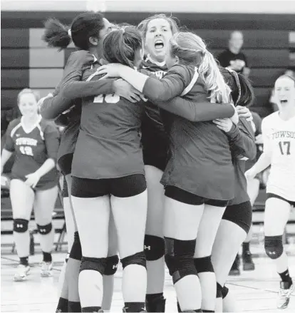  ?? KAREN JACKSON/FOR THE BALTIMORE SUN MEDIA GROUP ?? Towson players rejoice after beating Poly in straight sets. The Generals will face No. 5 Atholton on Monday in a Class 3A state semifinal.