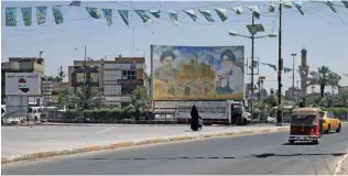  ?? - Reuters ?? REMARKABLE COMEBACK: A general view of a street in Sadr City district of Baghdad, Iraq on May 19, 2018.