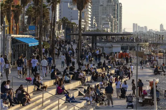  ?? Getty Images ?? A beach in Tel Aviv. Israel’s economy is thought to have shrunk 5 per cent annually in the fourth quarter, bringing 2023 growth down to 1.5 per cent