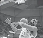  ??  ?? Rockets guard James Harden dunks during the first half, when he scored 21 of his 26 points Wednesday before the Bucks changed their defensive strategy.