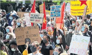  ?? STEVE RUSSELL PHOTOS TORONTO STAR ?? Thousands took to downtown streets on Saturday afternoon to demand answers after the death of Regis Korchinski-Paquet, who fell from the 24th-floor balcony of a High Park apartment building.