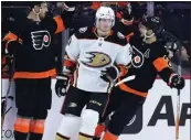  ?? MATT SLOCUM — THE ASSOCIATED PRESS ?? The Ducks' John Klingberg, center, has started to find his offensive game, just in time for Friday's trade deadline.