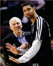  ?? Staff file ?? Popovich and Hall of Famer Tim Duncan teamed to bring the Spurs five NBA championsh­ips, including the first in 1999.