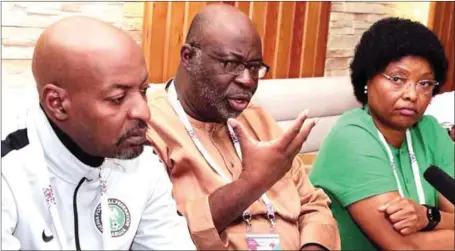  ?? Photo; Abiodun Ajala ?? The 1st Vice President, Nigeria Football Federation (NFF), Seyi Akinwunmi, flanked by the Chairman, NFF Media & Publicity Committee, Hon. Suleiman Yahaya-Kwande (left) and Vice Chairman, NFF Media & Publicity Committee, Ms. Aisha Falode during a press...