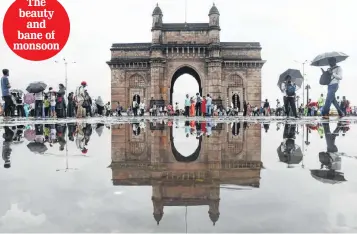  ?? PIC : SALMAN ANSARI ?? Reflection­s of a rainy day ..... at the Gateway