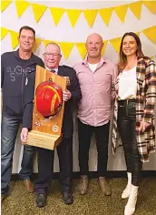  ?? ?? Former Drouin Fire Brigade captain of 38 years John Atkins (second left) with his family Peter, Dean and Mindi Atkins.