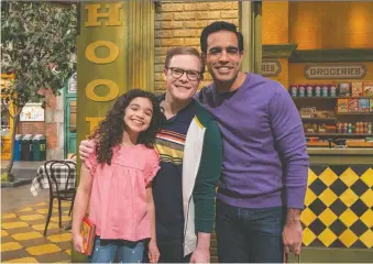  ?? TERMINE/SESAME WORKSHOP
RICHARD ?? Mia, left, with her two dads, Dave and Frank, made their debut on Sesame Street’s Family Day episode.