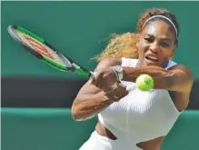 ?? AP PHOTO/BEN CURTIS ?? Serena Williams returns a shot to Barbora Strycova during a semifinal match Thursday at Wimbledon. Williams, who needed just 59 minutes to beat Strycova 6-1, 6-2, faces Simona Halep for the title on Saturday.