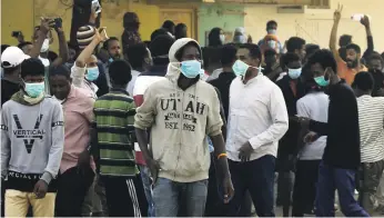  ??  ?? Sudanese demonstrat­ors taking part in an anti-government protest in Khartoum last week Reuters