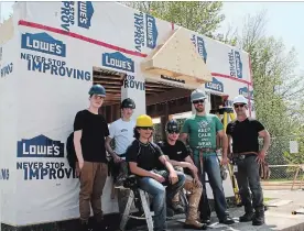  ?? KRIS DUBE SPECIAL TO THE WELLAND TRIBUNE ?? Notre Dame students Josh Nolet, David Papineau, Alessandro Dipalo and Noah Rotchille with Niagara College teacher Alex Lukas and Notre Dame teacher Dino Nardangeli at Niagara Safety Village on Wednesday, where the students are working on the Village’s...