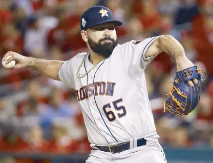  ?? AP ?? Houston Astros starting pitcher Jose Urquidy throws against the Washington Nationals during the first inning of Game 4 in Washington.