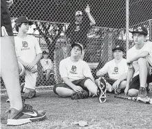  ?? Elizabeth Conley / Staff photograph­er ?? Outfielder Justin Michaelis, second from left, was one of four Post Oak players to bat .500 or better in the Southwest Region, going 7-for-14 with five RBIs in those four games.