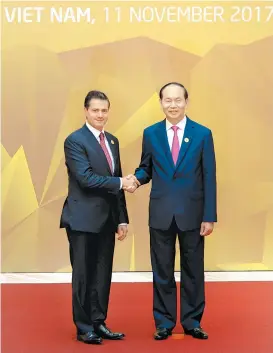  ??  ?? El presidente mexicano con su homólogo vietnamita, Tran Dai Quang.