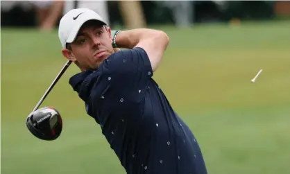  ?? ?? Rory McIlroy tees off during a practice round at the 2022 Masters. Photograph: Mike Segar/Reuters