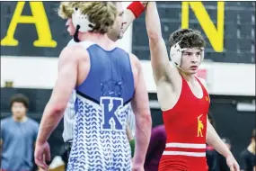  ?? NATE HECKENBERG­ER - FOR MEDIANEWS GROUP ?? West Chester East’s Max Parnis gets his hand raised after a 9-1win over Kennett’s Tyler Maiers in the 152-pound final at the Solanco Tournament on Saturday.