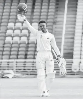  ?? ?? Alick Athanaze celebratin­g his hundred on day two against Leeward Islands Hurricanes