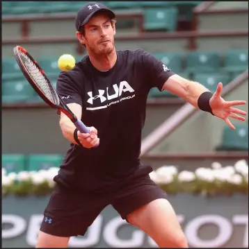  ??  ?? Back to basics... Andy Murray was performing routine drills on the practice court with coach Ivan Lendl