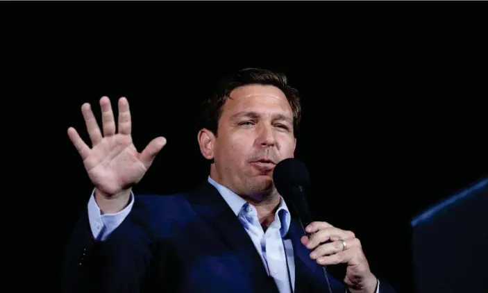  ?? Photograph: Tom Brenner/Reuters ?? Governor Ron Desantis of Florida in October 2020. Local news outlets were barred from DeSantis’s signing of the bill on Thursday.