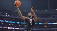  ?? USA TODAY SPORTS ?? Clippers forward Montrezl Harrell moves to the basket against the Bulls during the first half Saturday at Staples Center.