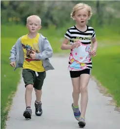  ?? LARRY WONG/ EDMONTON JOURNAL ?? Christine Nyback, 7, and her brother Andrew, 5, are both registered for the Kids of Steel Triathlon next weekend.