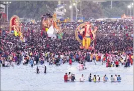  ?? BL SONI ?? Thousands throng the Girgaum Chowpatty to bid adieu to the state’s favourite God Ganesh on Tuesday after an 11-day festival.