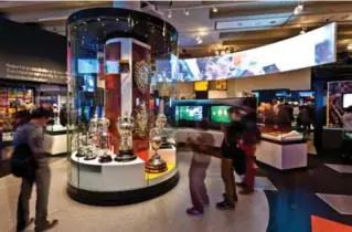  ?? NATIONAL FOOTBALL MUSEUM ?? Visitors can learn about the world’s best soccer players and can even practise their goalkeepin­g skills in a hands-on exhibit at the National Football Museum in Manchester.