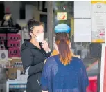  ??  ?? Pharmacies are posting staff at their entrances to screen customers before allowing them to come into the premises to drop off prescripti­ons and collect medicine.